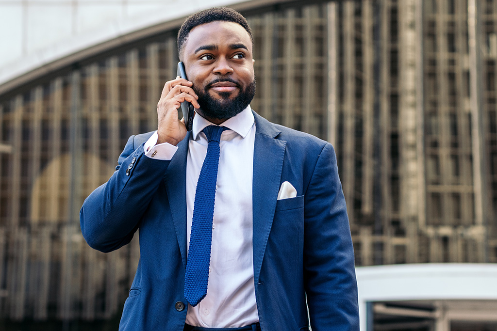 Man on cell phone in a business suit